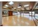Large multi-purpose room with mirrors, ceiling fans, and great natural light at 2561 Cosmic Dust St, Henderson, NV 89044