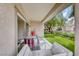 Inviting covered patio with outdoor seating, perfect for relaxation and entertaining at 2561 Cosmic Dust St, Henderson, NV 89044