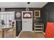 Unique bedroom with striking dark walls, tile flooring, and eclectic furniture at 2706 Colanthe Ave, Las Vegas, NV 89102