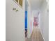 Bright hallway with wood floors leading to colorful rooms at 2706 Colanthe Ave, Las Vegas, NV 89102