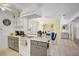 Open kitchen showcasing grey cabinets, tile floors, and stylish decor at 2706 Colanthe Ave, Las Vegas, NV 89102