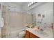 Well-maintained bathroom features a shower-tub combo and a large vanity at 2727 Warm Rays Ave, Henderson, NV 89052