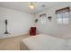 Spacious bedroom featuring ample natural light and comfortable seating at 2727 Warm Rays Ave, Henderson, NV 89052