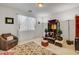 Serene bedroom featuring a floral rug, soft window light, and minimalist decor at 2727 Warm Rays Ave, Henderson, NV 89052