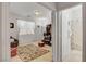 Bright bedroom with ample natural light, neutral carpet, and an adjacent bathroom at 2727 Warm Rays Ave, Henderson, NV 89052