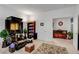 Bonus room featuring a floral rug, soft window light, and minimalist decor at 2727 Warm Rays Ave, Henderson, NV 89052