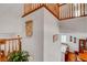 Grand foyer boasts high ceilings and beautiful wood railing at 2727 Warm Rays Ave, Henderson, NV 89052