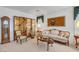 Cozy living room with antique furniture, creating a comfortable and stylish setting for relaxation and entertaining at 2727 Warm Rays Ave, Henderson, NV 89052