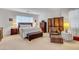 Cozy main bedroom features a wooden bed, dresser, and side tables at 2727 Warm Rays Ave, Henderson, NV 89052