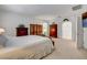 Bedroom showing neutral decor and access to the bathroom at 2727 Warm Rays Ave, Henderson, NV 89052