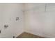 Functional laundry room with shelving, utility connections, and wood-look flooring at 2958 Al De La St, Las Vegas, NV 89146