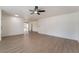 Expansive living room featuring durable laminate flooring and neutral paint to allow for easy customization at 2958 Al De La St, Las Vegas, NV 89146