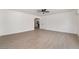 Bright living room with modern flooring and open access to other rooms at 2958 Al De La St, Las Vegas, NV 89146
