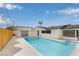 Backyard view of the sparkling pool with a spacious patio and partial view of the house at 2958 Al De La St, Las Vegas, NV 89146