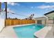 Backyard oasis with a large, inviting pool and a privacy fence, perfect for relaxation and enjoyment at 2958 Al De La St, Las Vegas, NV 89146
