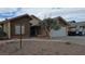 Charming single-story home with desert landscaping, a two-car garage, and a neutral color scheme at 3115 Floral Vista Ave, Henderson, NV 89014