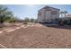 Expansive backyard featuring desert landscaping, a patio area, and recreational space with plenty of room to relax at 3169 Crystal Moon Rd, Henderson, NV 89052