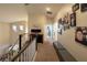 Second story hallway featuring carpeted floor, built in benches, home office, and Gathering photos at 3169 Crystal Moon Rd, Henderson, NV 89052