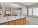 Bathroom features double sinks, soaking tub, and walk-in shower at 319 Fox Lake Ave, Las Vegas, NV 89148