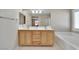 Bathroom boasts double sinks, soaking tub, and decorative orchid at 319 Fox Lake Ave, Las Vegas, NV 89148