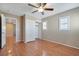 Bedroom features hardwood floors, a ceiling fan, closet and bright, natural light at 319 Fox Lake Ave, Las Vegas, NV 89148