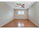 Bright bedroom features a ceiling fan and natural light through shuttered window at 319 Fox Lake Ave, Las Vegas, NV 89148