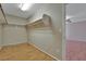 Walk-in closet offers ample hanging storage and wood flooring at 319 Fox Lake Ave, Las Vegas, NV 89148