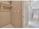 Hallway featuring a coat rack and access to other rooms in the house at 319 Fox Lake Ave, Las Vegas, NV 89148