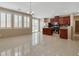 Well-lit kitchen with stainless steel appliances and a center island perfect for food preparation and gathering at 319 Fox Lake Ave, Las Vegas, NV 89148