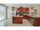Kitchen features a center island, stainless steel appliances, and beautiful cabinetry with ample storage space at 319 Fox Lake Ave, Las Vegas, NV 89148