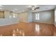 Open living room features hardwood floors, ceiling fan, and recessed lighting at 319 Fox Lake Ave, Las Vegas, NV 89148