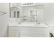Bright bathroom with a double sink vanity and large mirror at 3225 Casey Dr # 203, Las Vegas, NV 89120