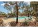 Refreshing community pool surrounded by lounge chairs and shaded seating areas, perfect for relaxation and socializing at 3225 Casey Dr # 203, Las Vegas, NV 89120