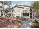 Inviting condo exterior with well-maintained landscaping and a charming walkway leading to the entrance at 3225 Casey Dr # 203, Las Vegas, NV 89120
