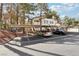 Charming condo featuring covered parking, lush landscaping, and mature trees create an inviting atmosphere at 3225 Casey Dr # 203, Las Vegas, NV 89120