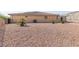 Spacious backyard with desert landscape and mountain views, perfect for outdoor living at 3439 Cottage Canyon St, Laughlin, NV 89029
