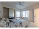 Inviting bedroom boasts mirrored closet doors, soft carpet, and bright, natural light from two windows at 3439 Cottage Canyon St, Laughlin, NV 89029