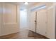 Light and bright home entryway features sleek wood-look floors and a front door at 3439 Cottage Canyon St, Laughlin, NV 89029