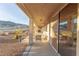 Spacious covered patio ideal for entertaining and enjoying scenic mountain and desert views at 3439 Cottage Canyon St, Laughlin, NV 89029