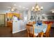 Open-concept dining area adjacent to the kitchen and living room, ideal for entertaining at 3491 Cottage Thistle Dr, Laughlin, NV 89029