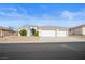 Charming single-story home with a three-car garage and low maintenance desert landscaping at 3491 Cottage Thistle Dr, Laughlin, NV 89029