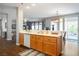 Modern kitchen features a peninsula countertop open to the dining and living areas at 3491 Cottage Thistle Dr, Laughlin, NV 89029