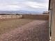 Spacious backyard featuring a gravel section, brick patio, and mountain views at 3530 E Moffat Ave, Pahrump, NV 89061