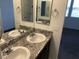 Bathroom vanity with double sinks and granite countertop at 3530 E Moffat Ave, Pahrump, NV 89061