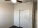 Simple bedroom with a ceiling fan and closet at 3530 E Moffat Ave, Pahrump, NV 89061