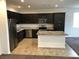 Modern kitchen with stainless steel appliances, granite countertops, and ample cabinet space at 3530 E Moffat Ave, Pahrump, NV 89061