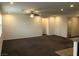 Spacious and open living area with carpet and recess lighting, and easy access to other rooms at 3530 E Moffat Ave, Pahrump, NV 89061
