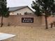 Burson Ranch community entrance sign with landscaped surroundings and tree framing at 3530 E Moffat Ave, Pahrump, NV 89061