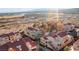Aerial view of a condo community with red tile roofs and desert landscaping at 3843 Desert Marina Dr # 232, Laughlin, NV 89029