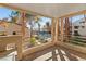 Pool views from this balcony with columns and neutral color scheme at 3843 Desert Marina Dr # 232, Laughlin, NV 89029